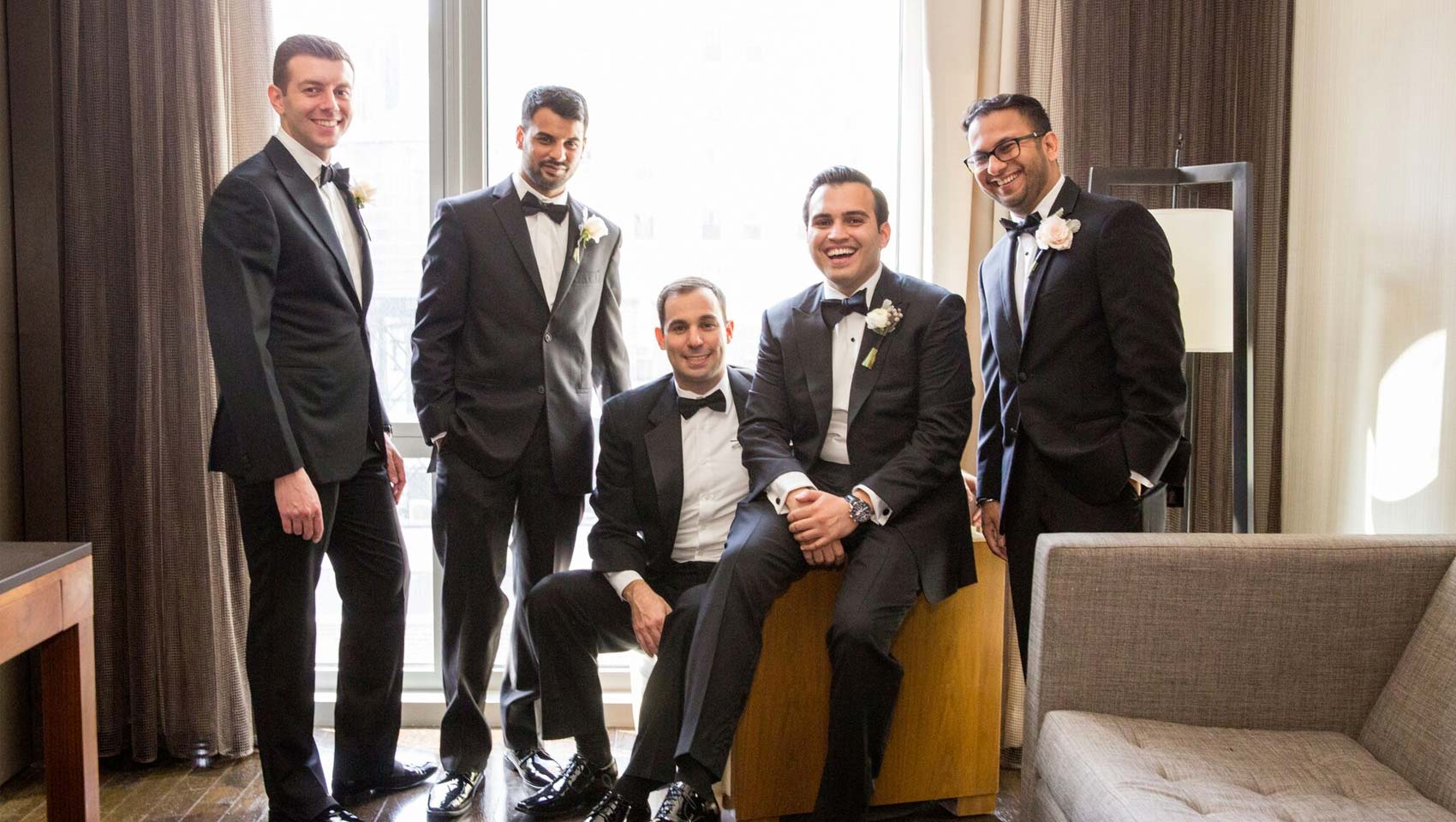 Groomsmen with Ravi all dressed in tuxedos for Ravi's wedding day