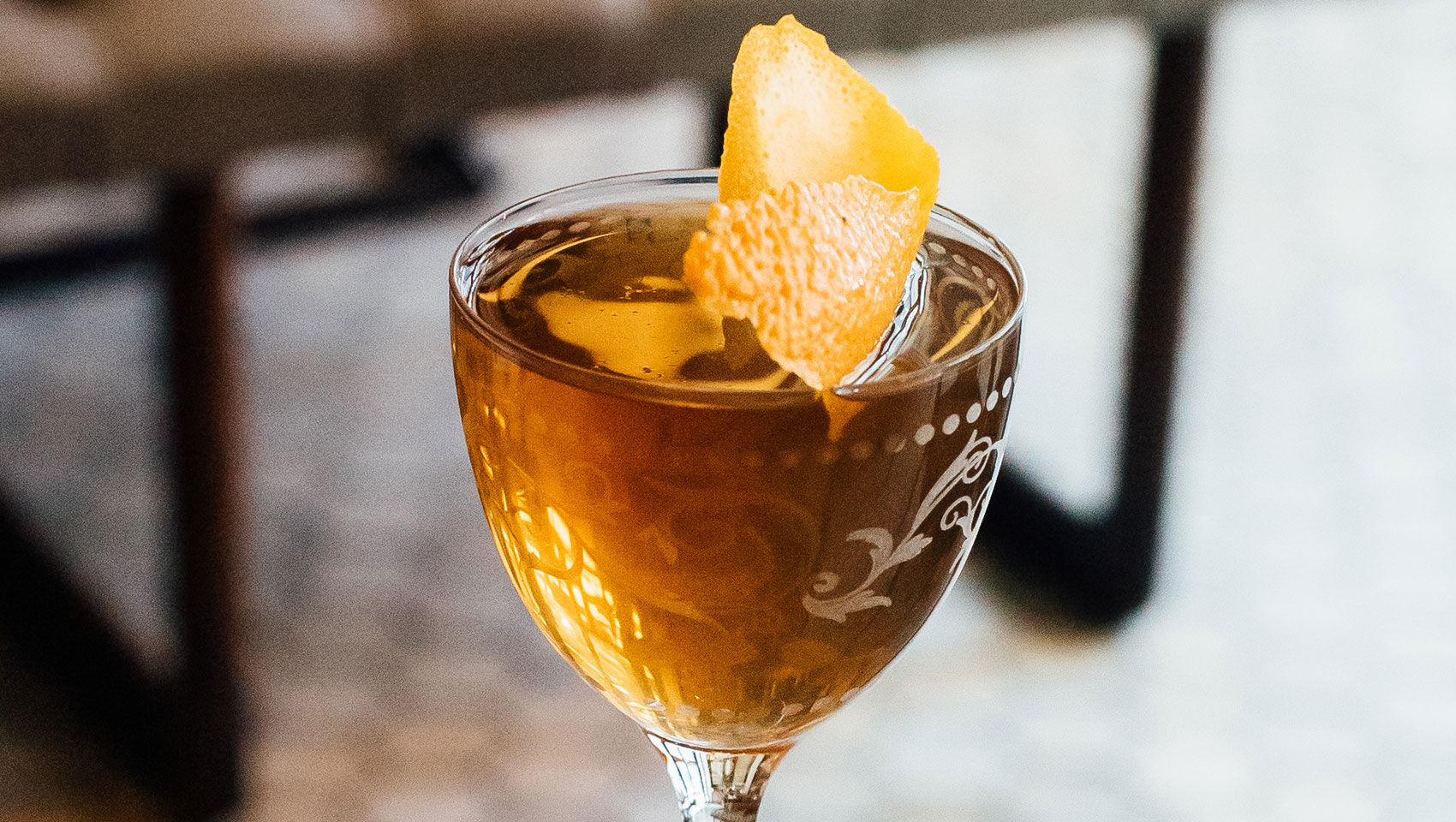 Back Bar cocktail with orange peel garnish