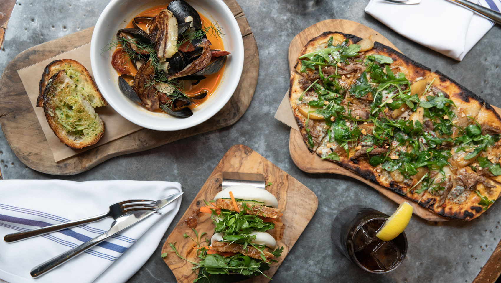 Back Bar shareable bites on top of wooden slabs on top of table